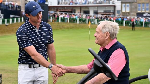 Rory McIlroy shakes hands with Jack Nicklaus after playing in the Celebration of Champions prior to last year's Open Championship at St Andrews