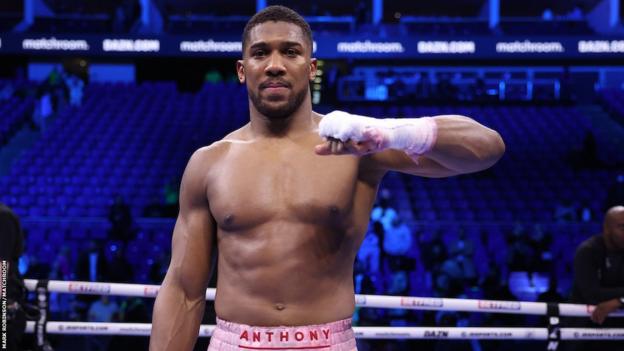 Anthony Joshua in the ring after beating JErmaine Franklin