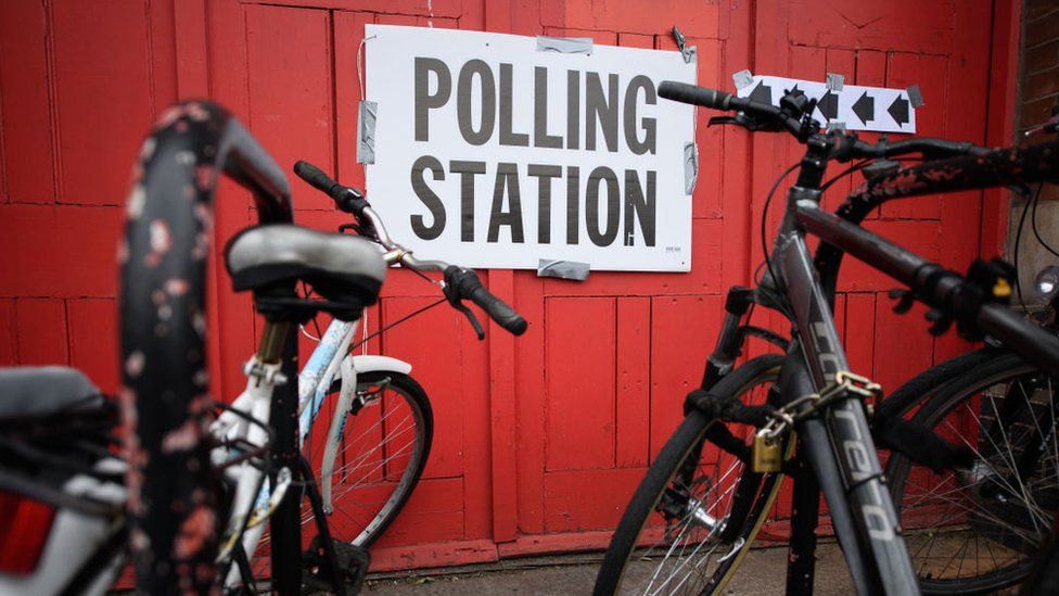 Bikes chained up outside a polling station