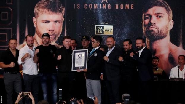 Saul 'Canelo' Alvarez and his six brothers on stage receiving a Guinness World Record