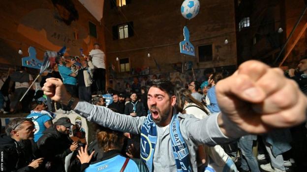 Napoli fans celebrate in the streets of Naples