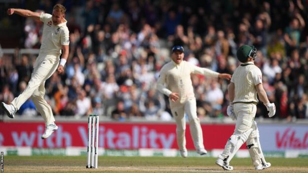 Stuart Broad leaping in celebration after taking the wicket of David Warner during the 2019 Ashes