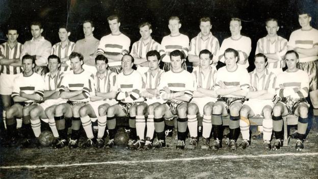 Caledonian and an Old Firm Select XI line up for a combined team photo before their match on 11 March 1959