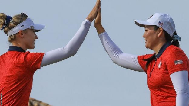 Nelly Korda and Allisen Corpuz high-five at the Solheim Cup